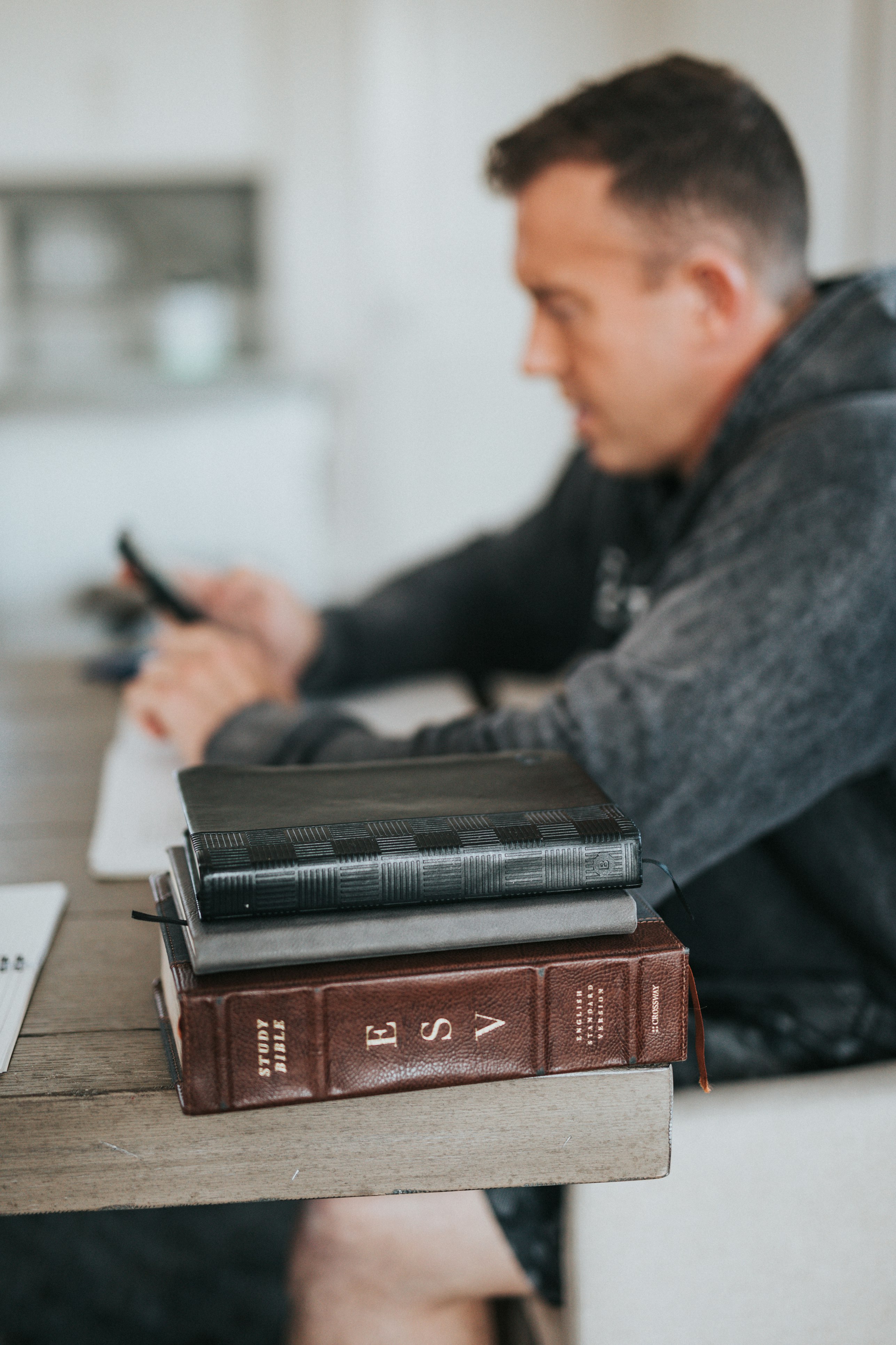 Open Bible with tea and flowers
